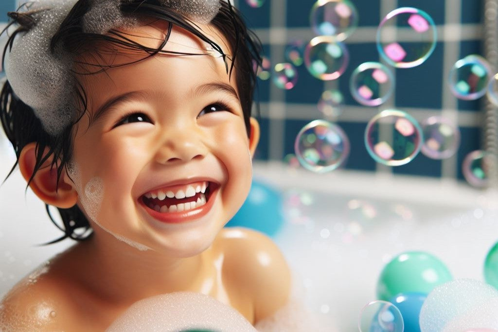 Cute boy in bath with lots of bubbles | Okoboji Soap Company