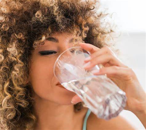 beautiful woman drinking water