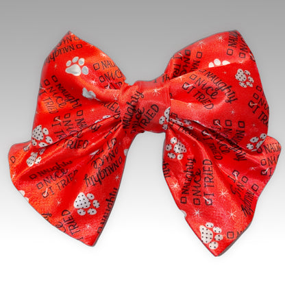 Red with paw prints Pet Bowtie front view with words "naughty, nice, I tried" Sailer Necktie