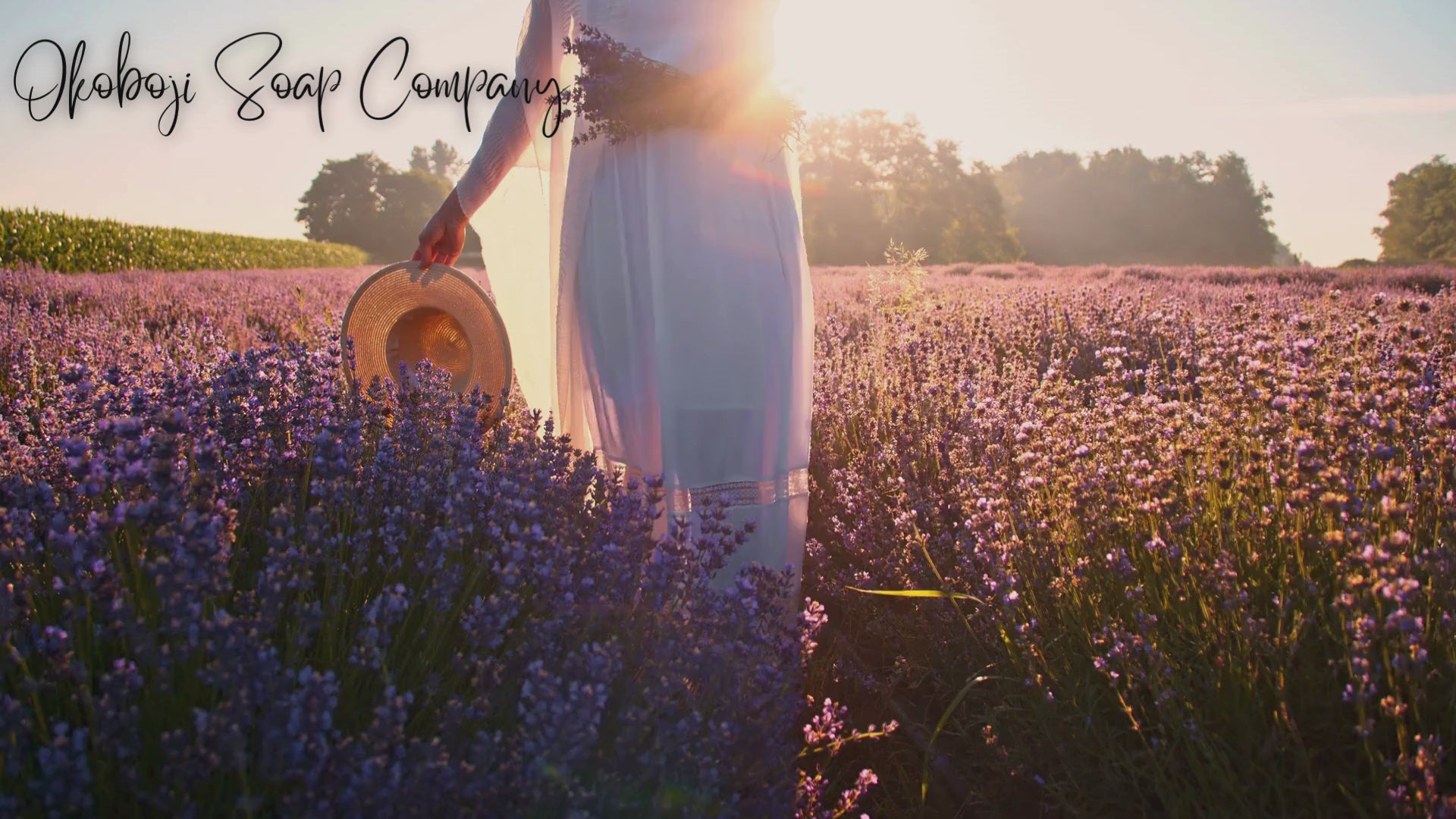 Load video: Video of woman walking through lavender.  Okoboji Soap Copany about us video